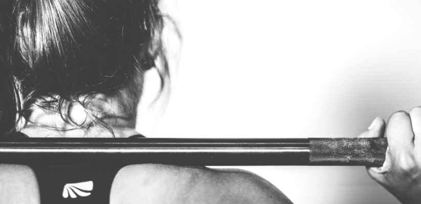women with a barbell